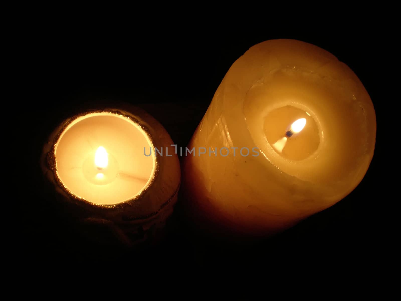 soft candle light on black background