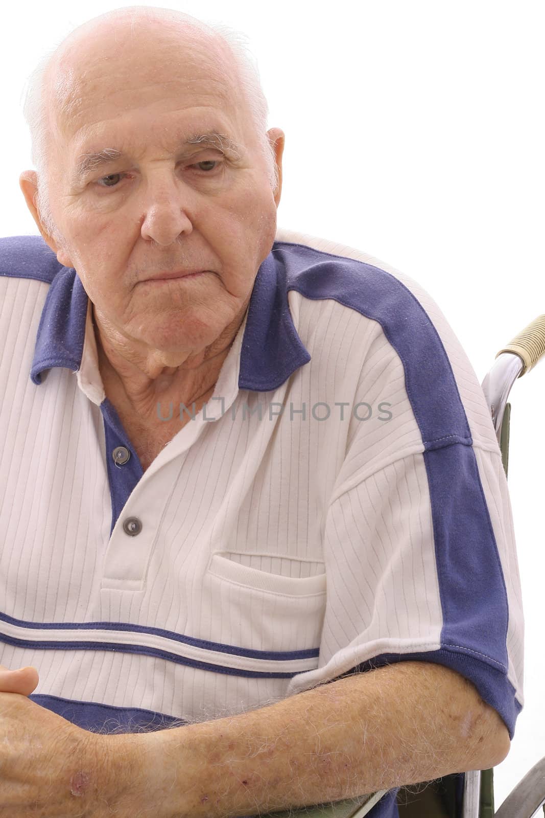 old man thinking in wheelchair