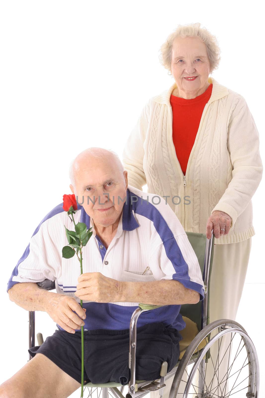 shot of a handicap senior with wife by creativestock