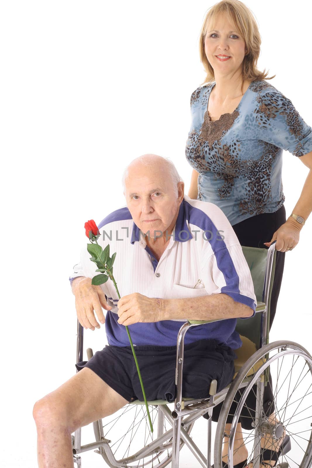shot of a beautiful daughter pushing her elderly father by creativestock