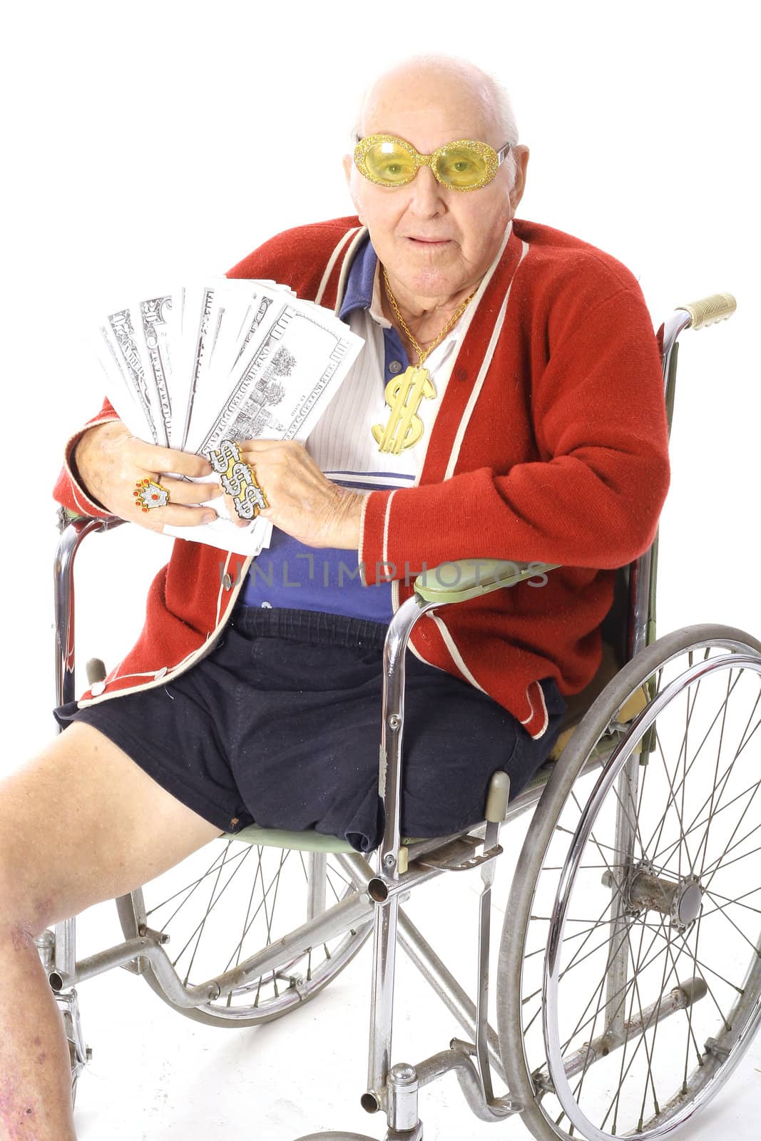 shot of a handicap man with lots of money by creativestock