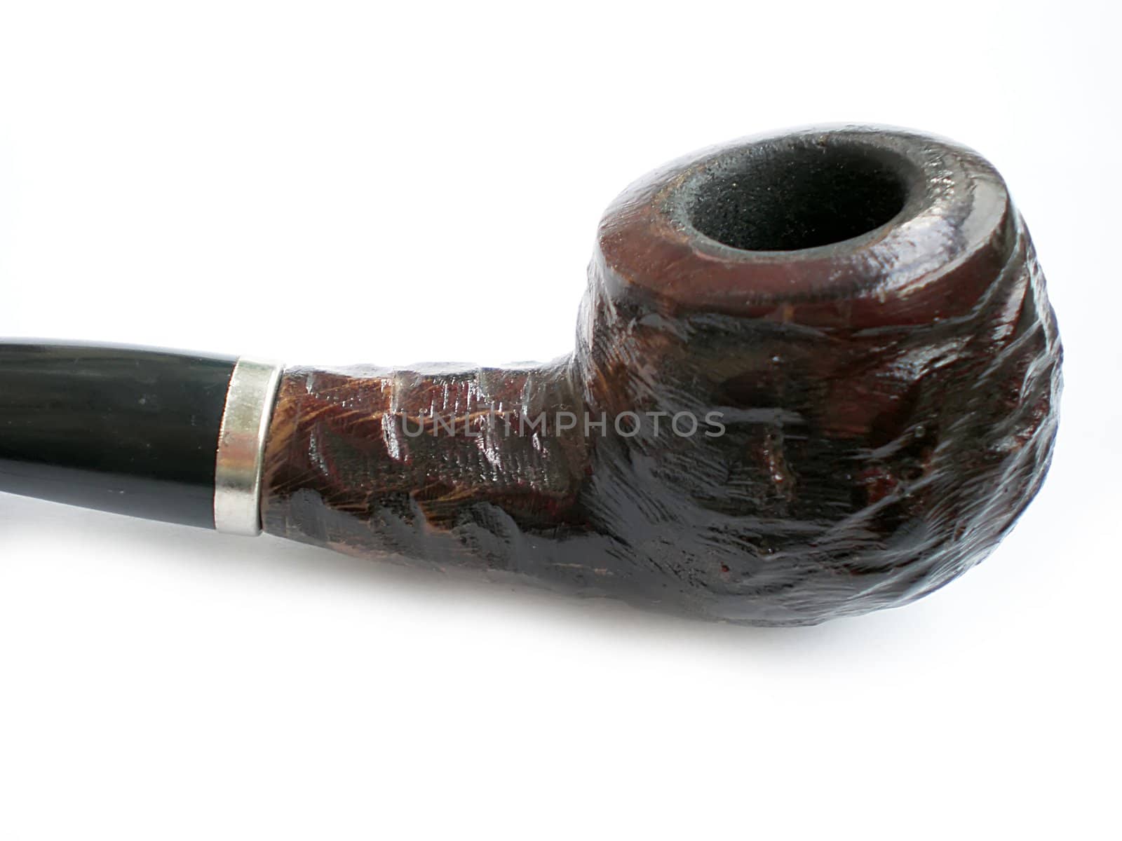 wooden pipe on white background