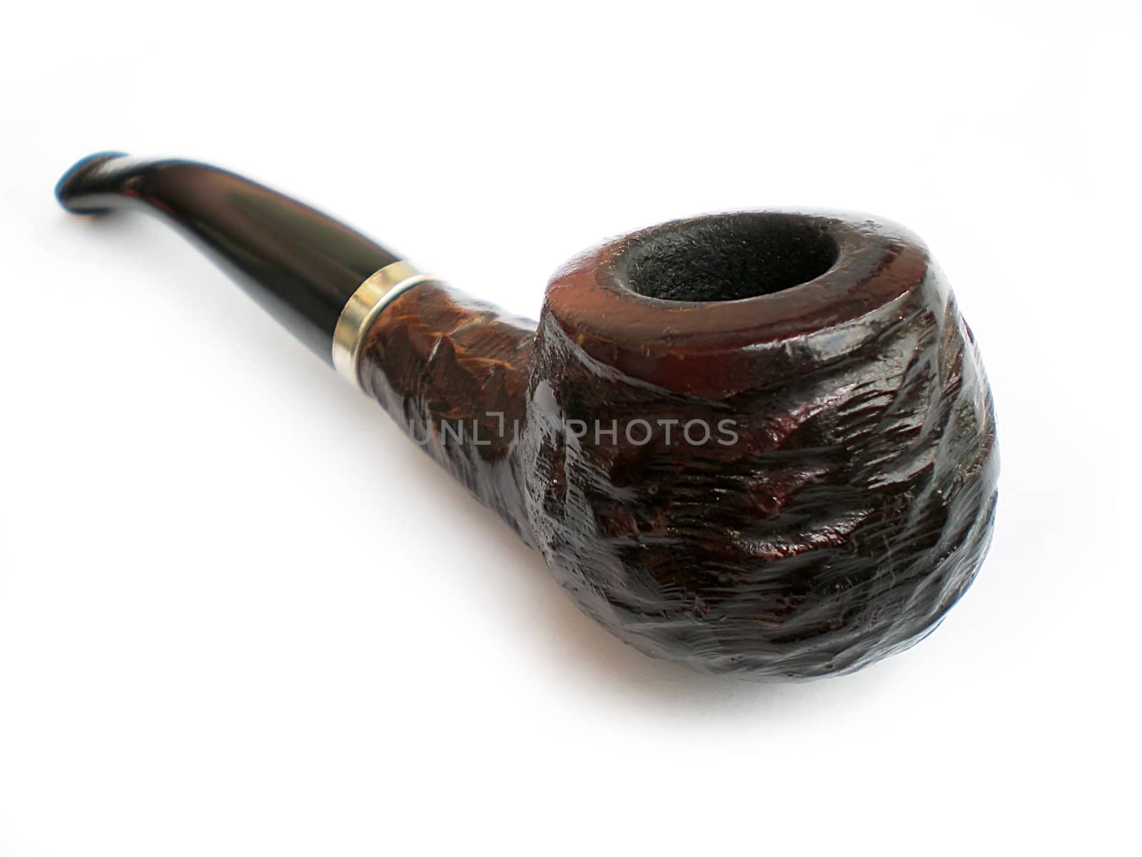 wooden pipe on white background