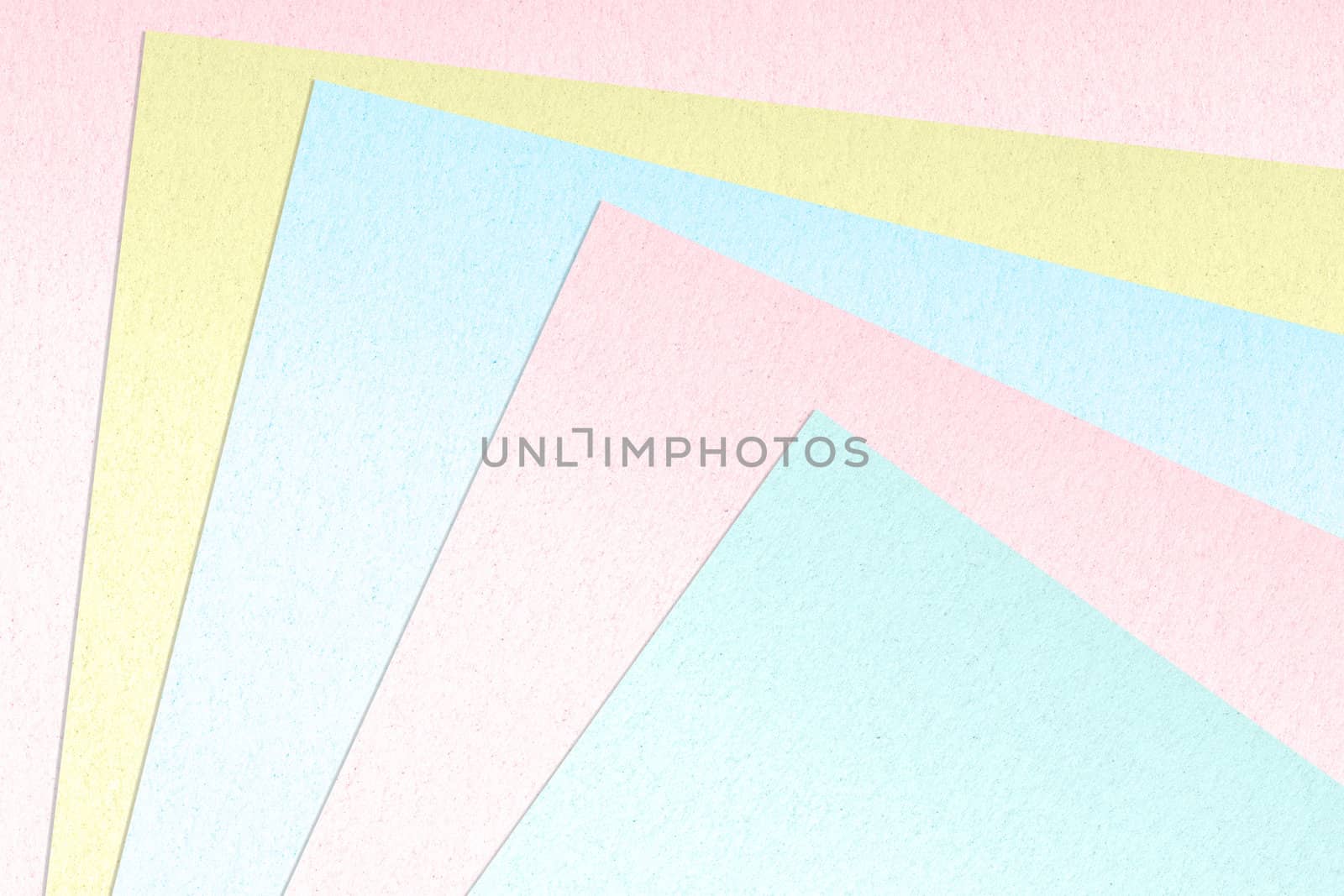 Color paper samples in various colors as background.