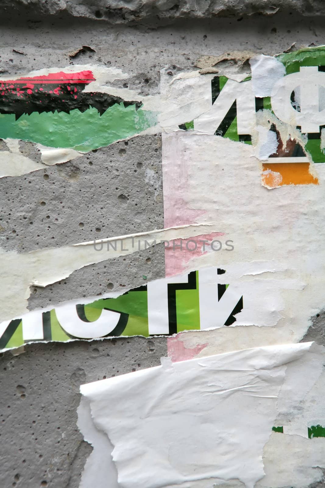 Texture, Varicolored Concrete Wall with Scrap of the Posters and Announcements, Background