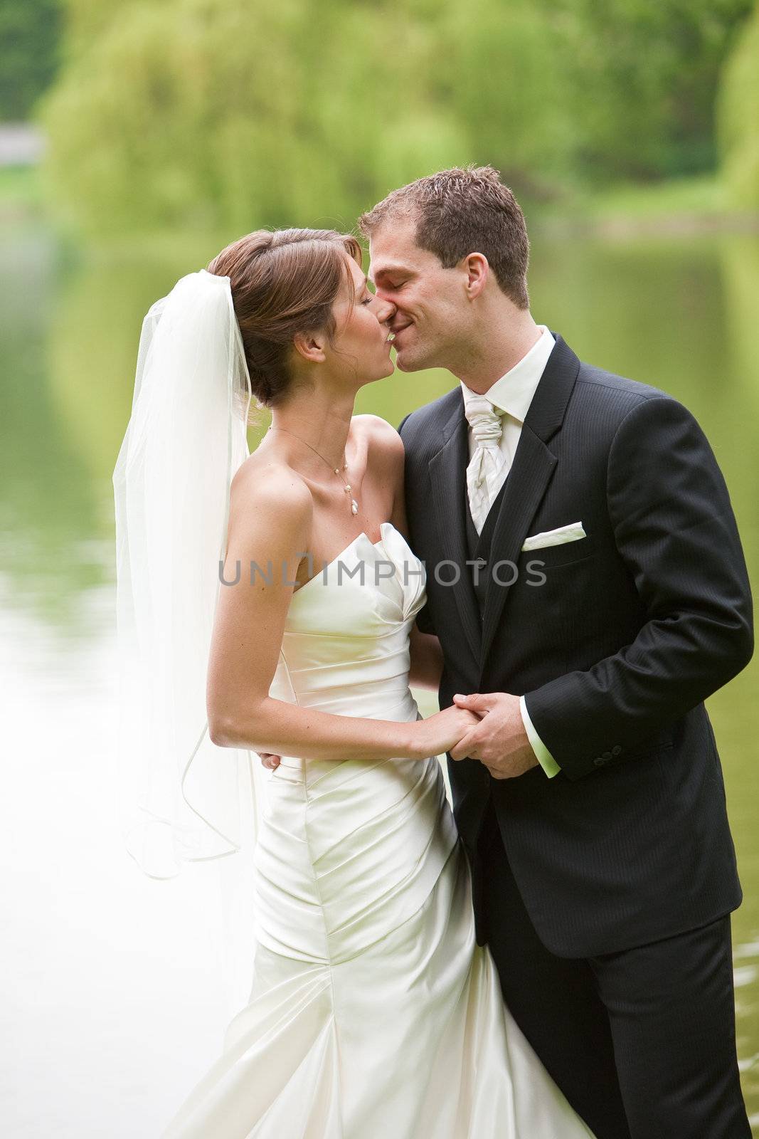 Young couple on their wedding day having a private moment