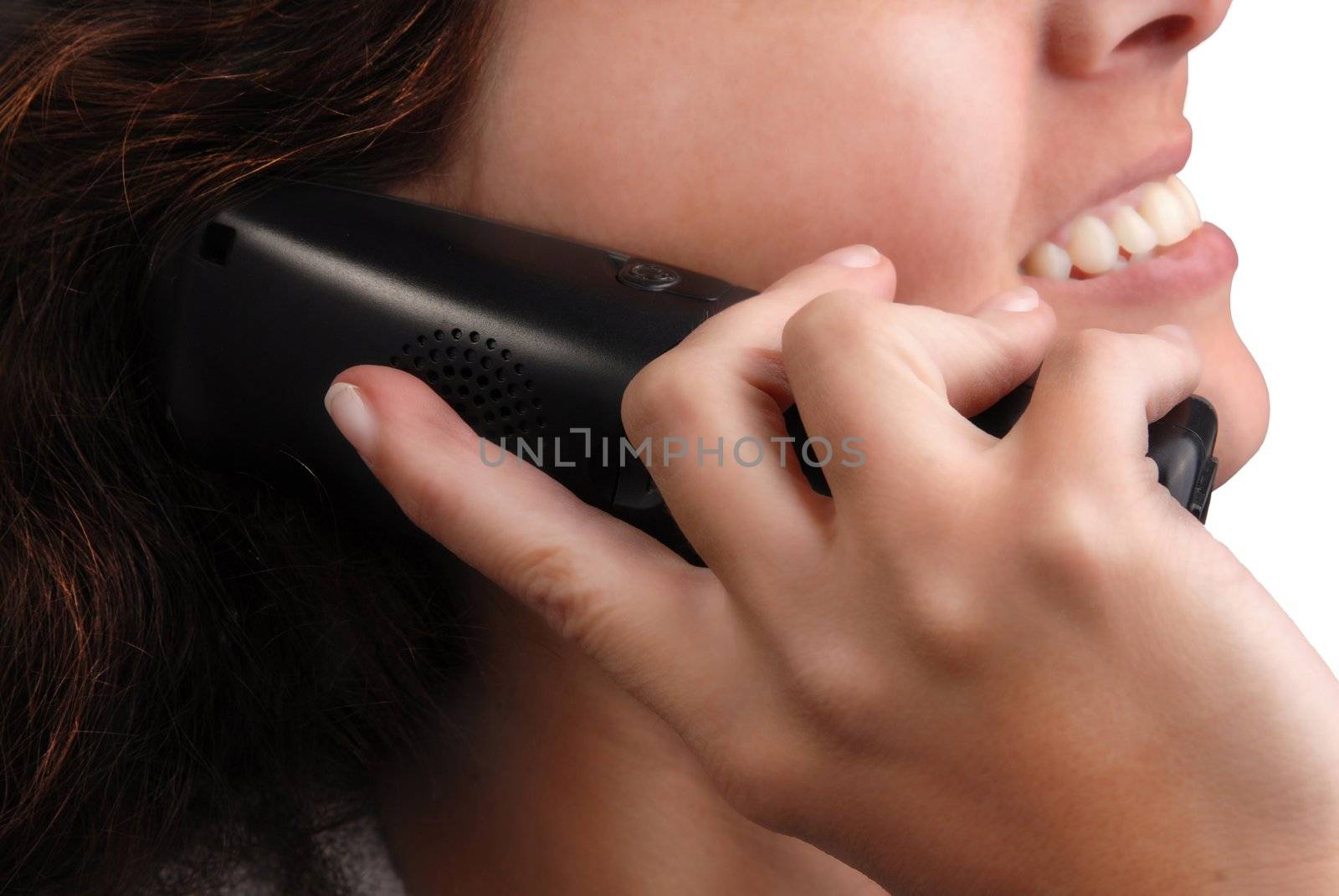 Close-up of womans lips talking on the phone. Isolated on white background