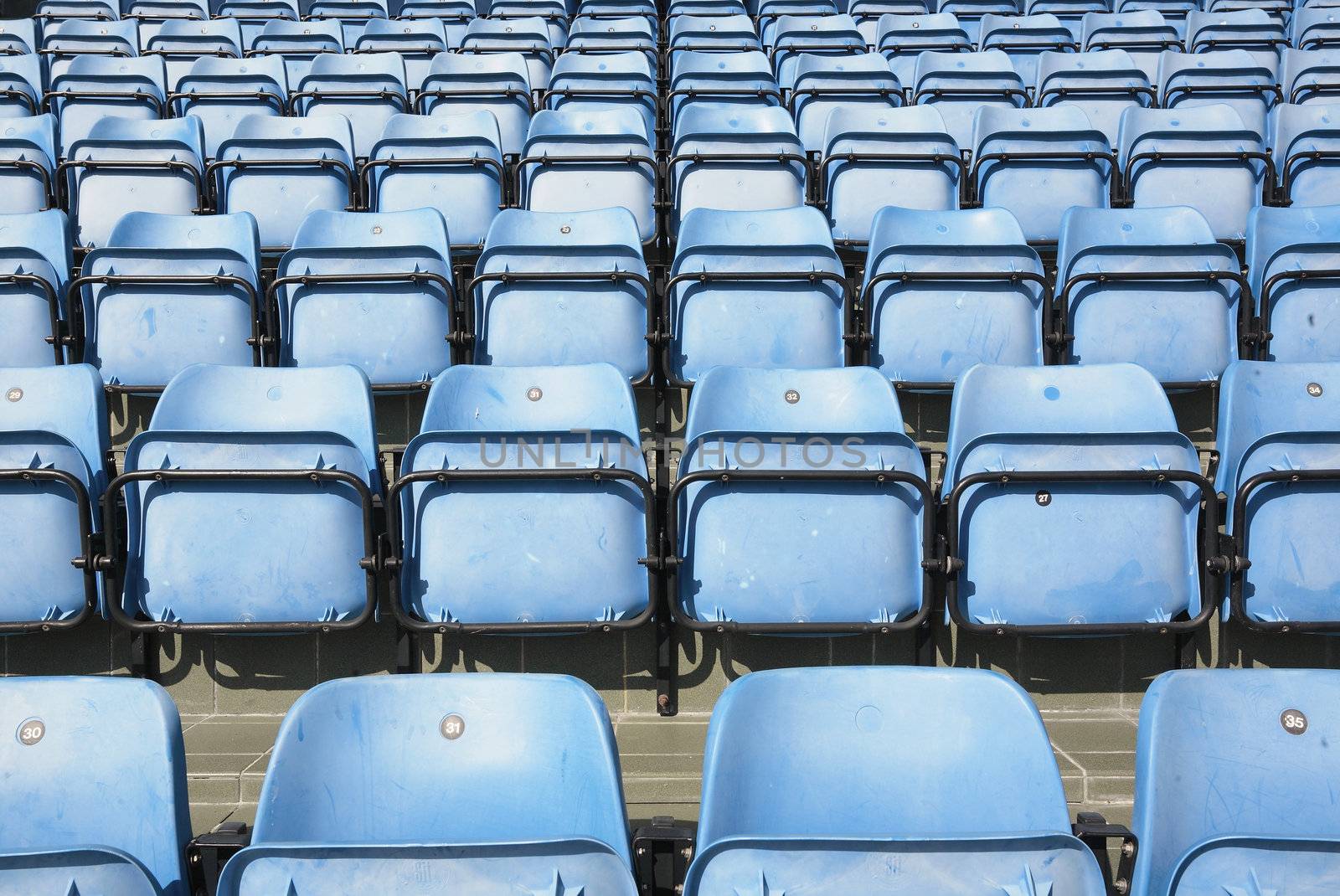 empty blue stadium seats