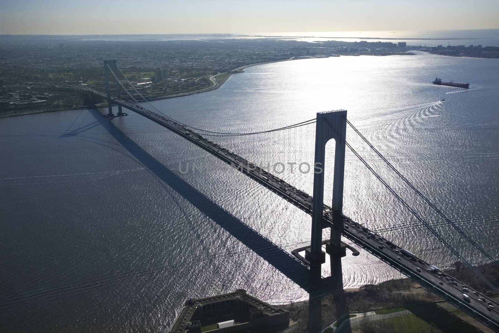 Aerial view of New York City's Verrazano-Narrow's bridge with ship.