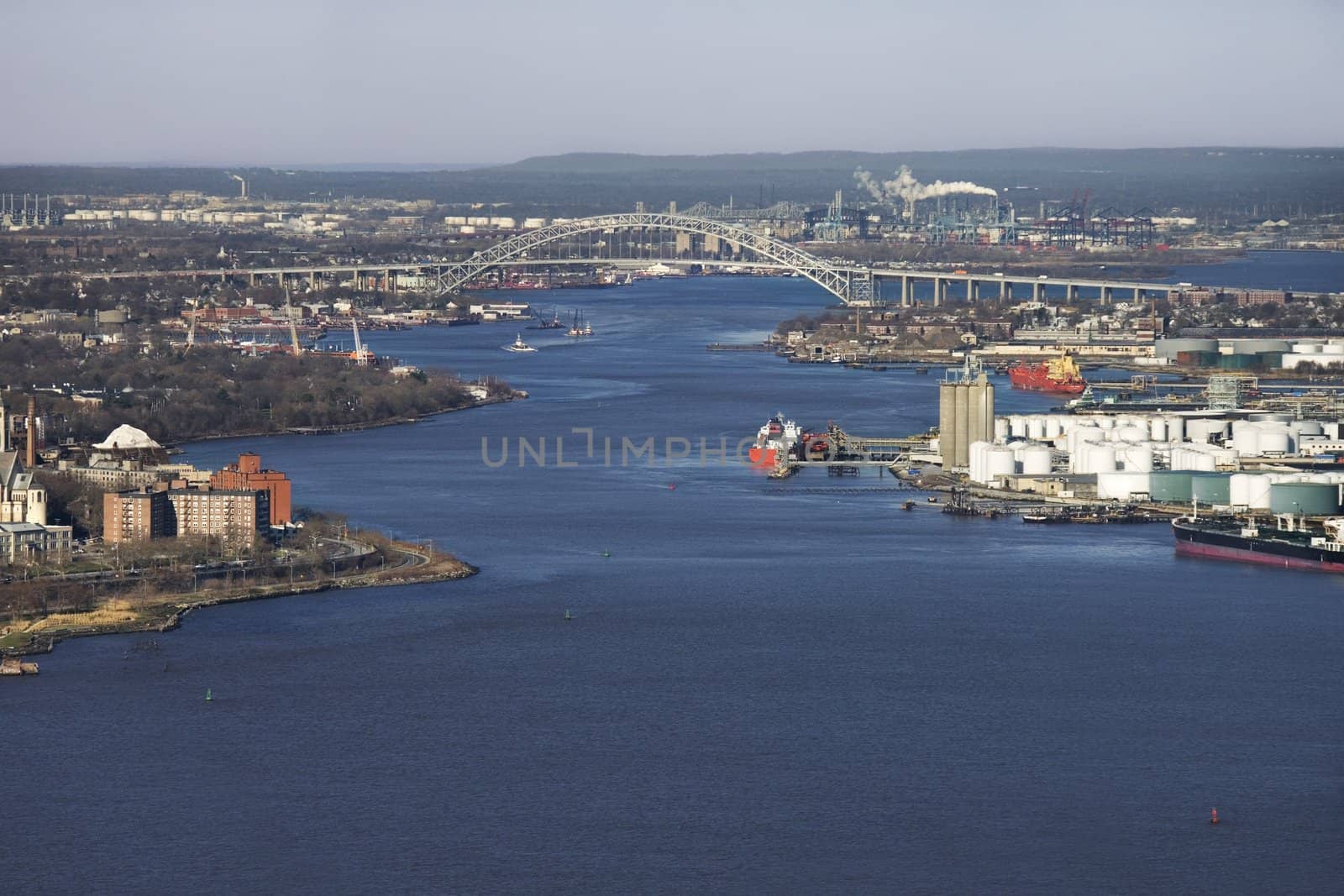 Aerial view of New York City's Bayonne Bridge and harbor.