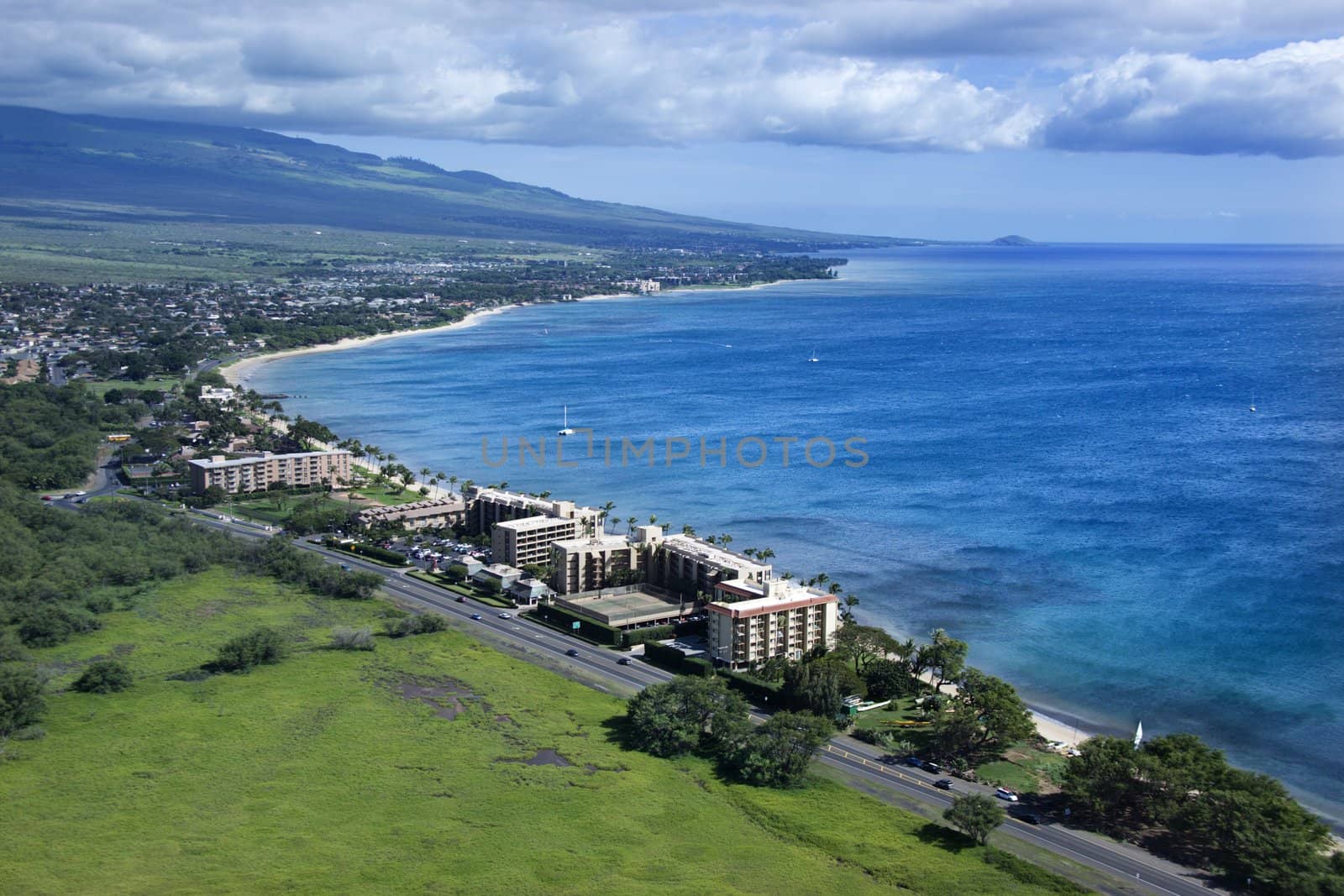 Aerial of Maui, Hawaii coastline with hotel resorts.
