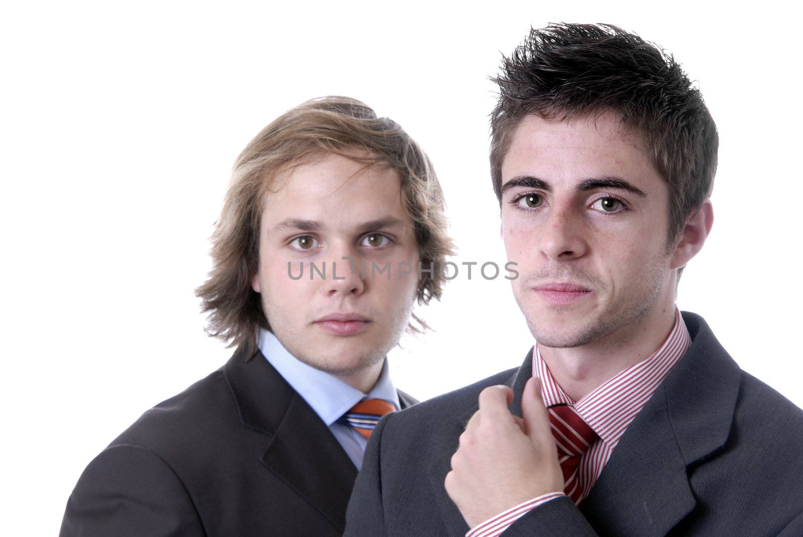 two young business men portrait on white. focus on the right man