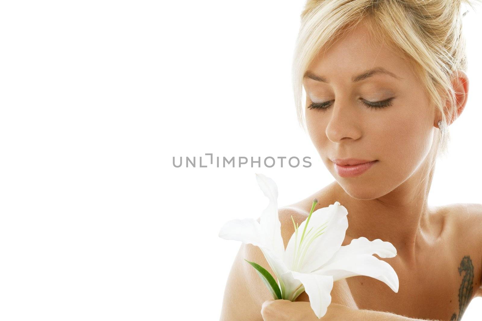 pretty lady with madonna lily over white background