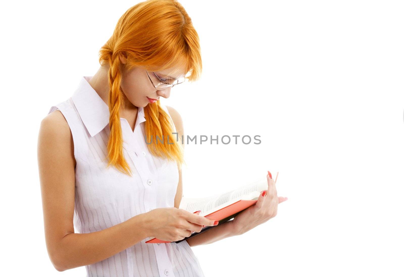 picture of lovely redhead reading red book