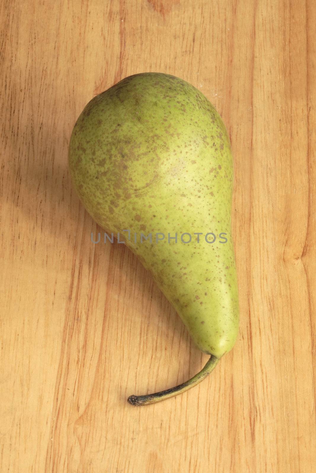 conference pear on a wooden board