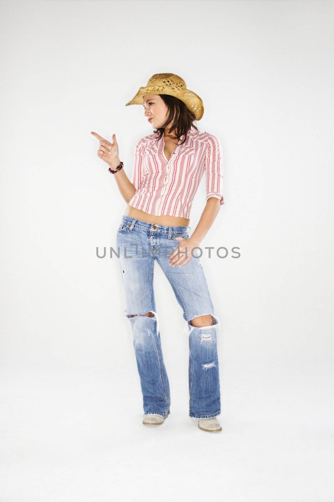 Cowgirl with imaginary gun. by iofoto