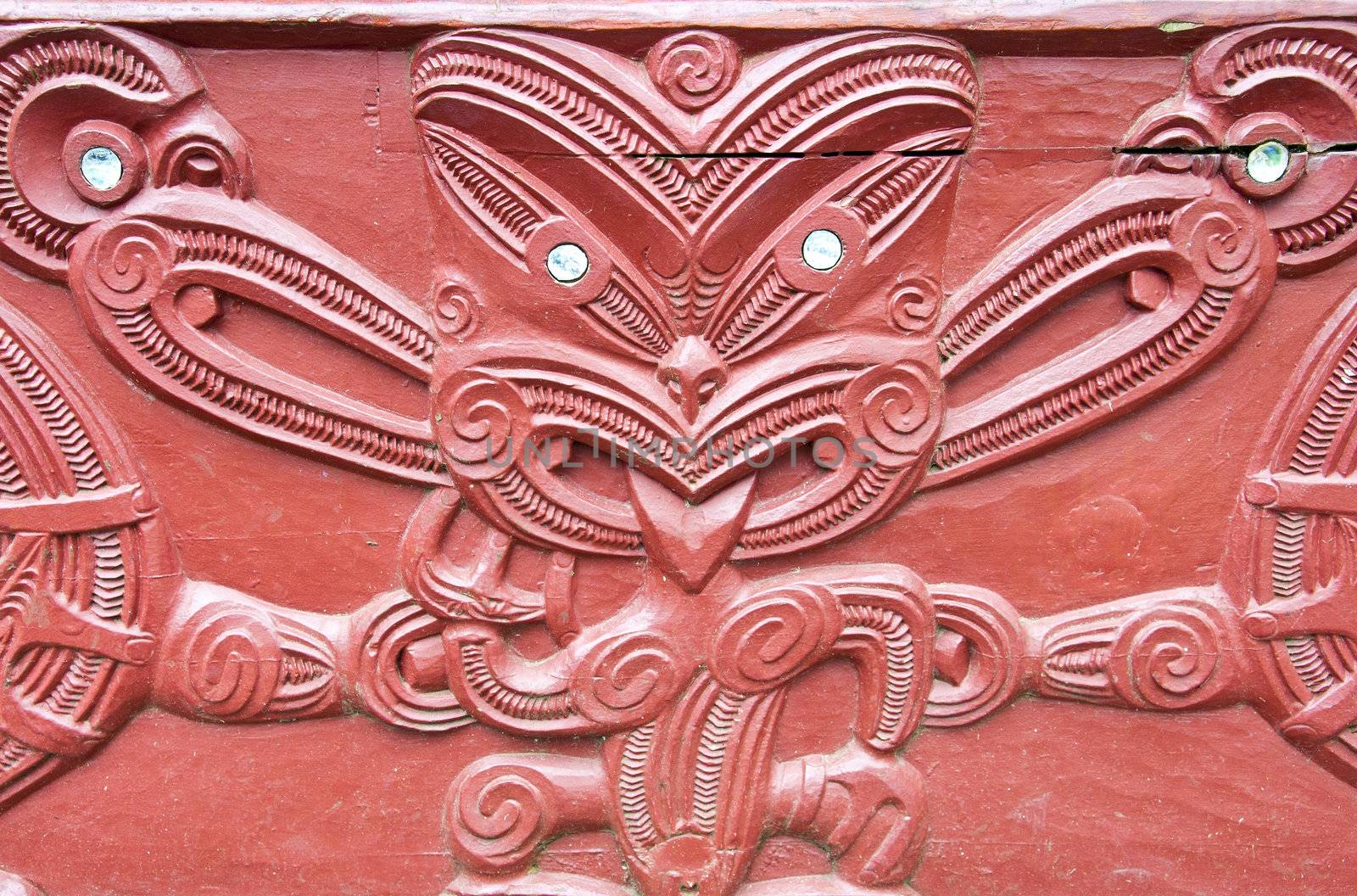 Maori wood carving outside the Maori meeting house at the Treaty Grounds 