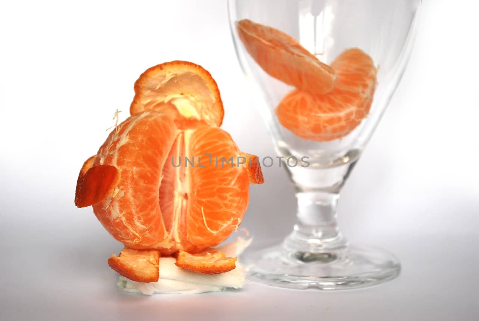 orange mandarine with glass ready to be juiced