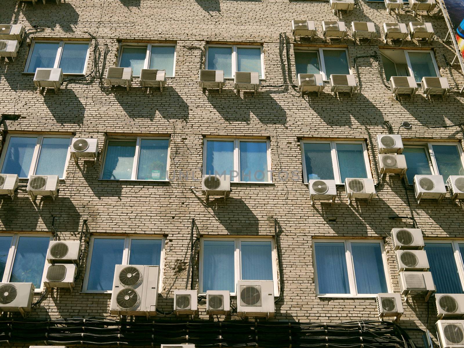 Air conditioners on the fasade ofoffice building. Taken in Moscow, Russia on Jone 2010
