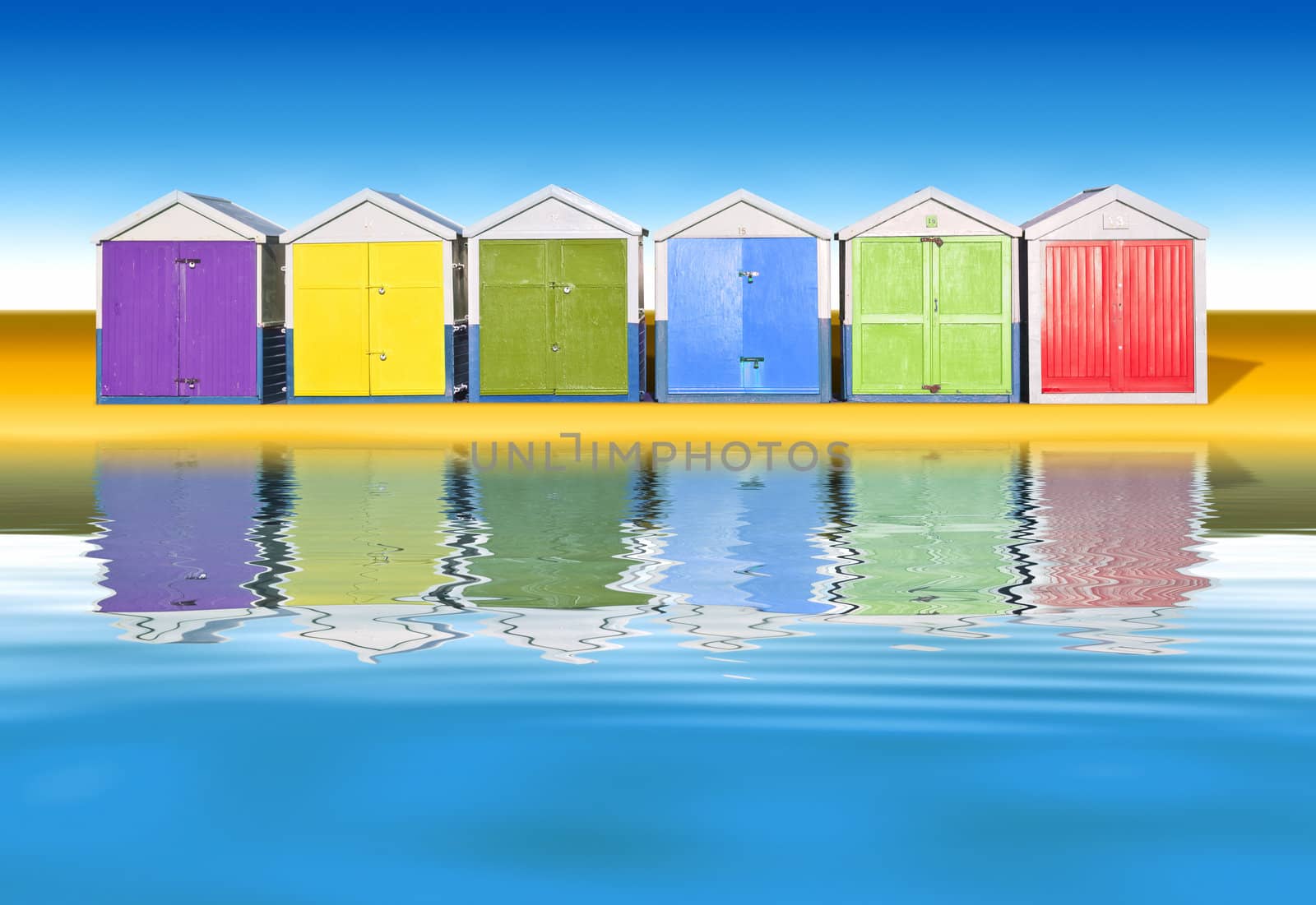 An image of colorful little beach huts