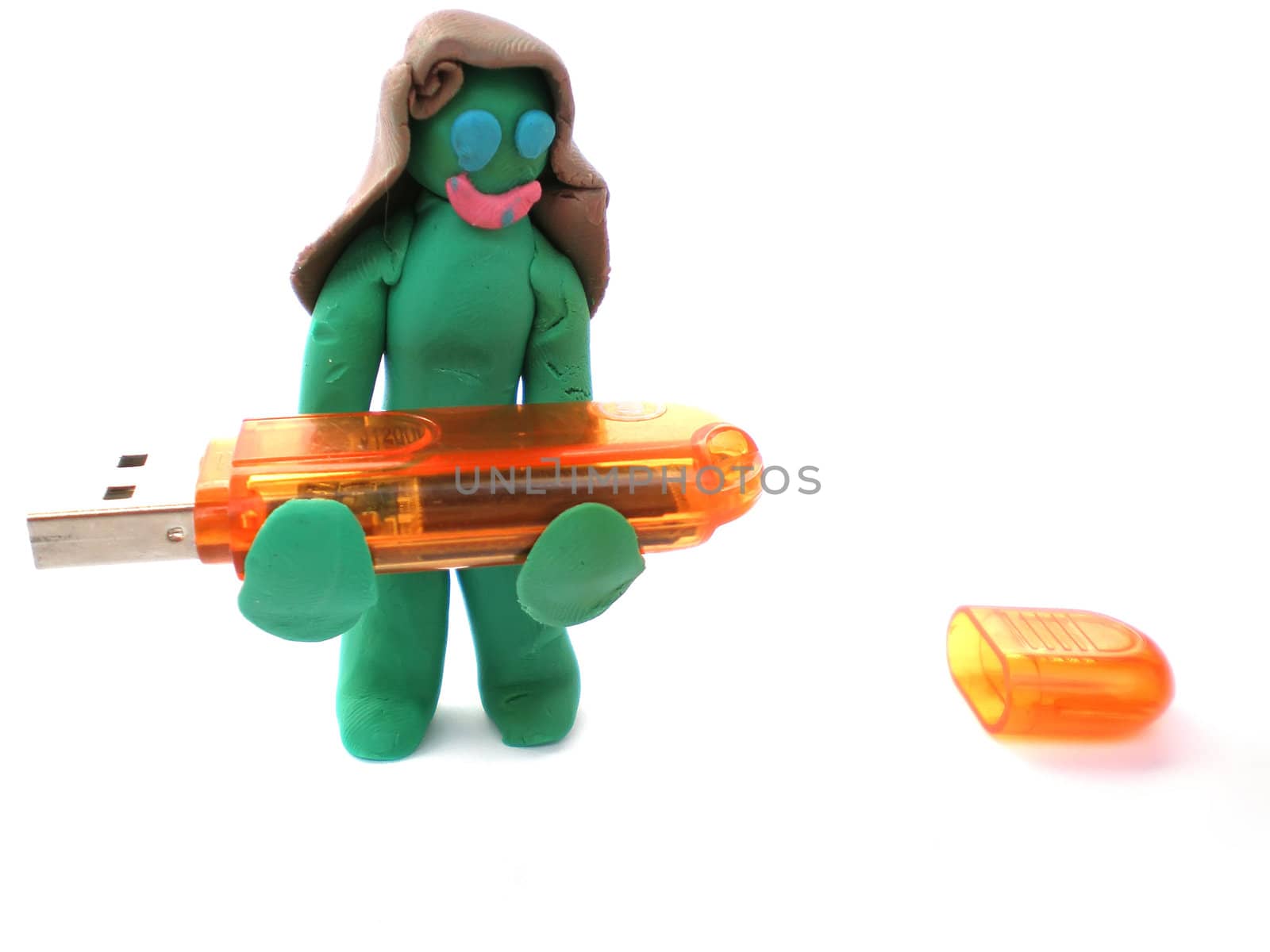 plasticine figure of a green woman carry a usb flash  
