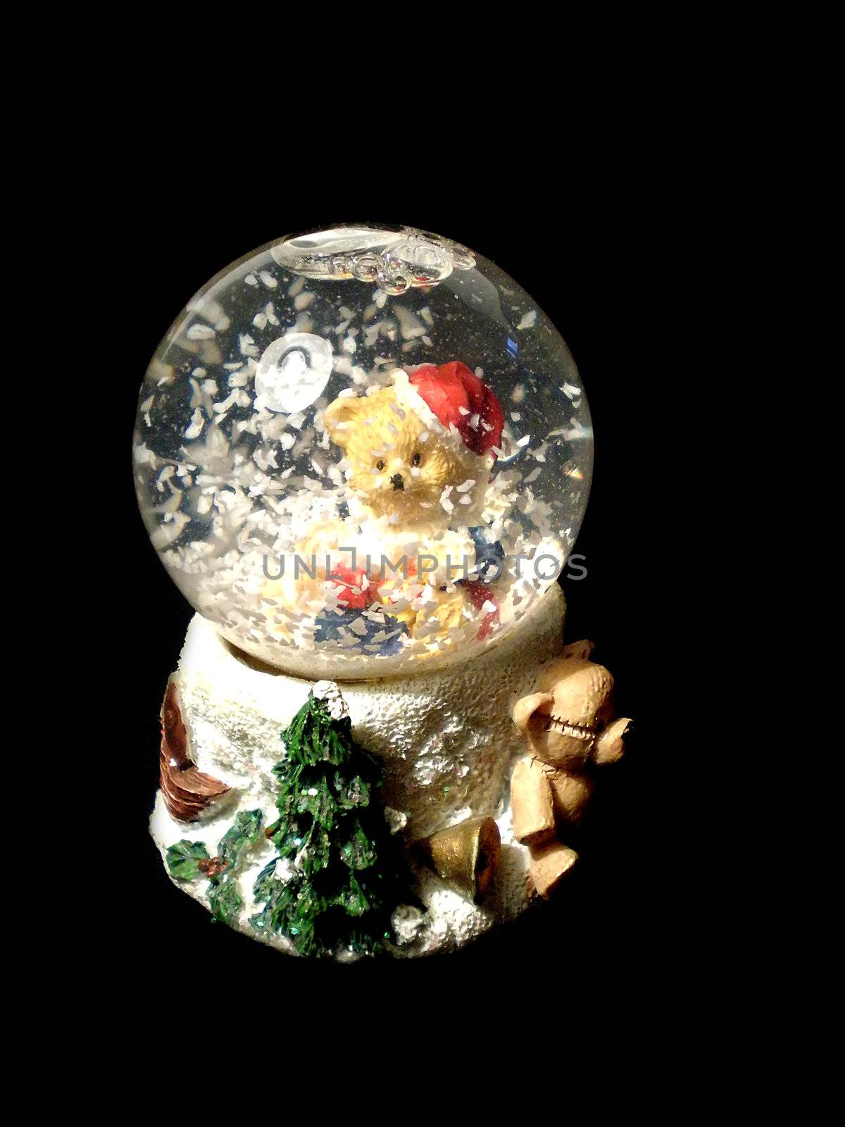 Christmas snow globe isolated on black