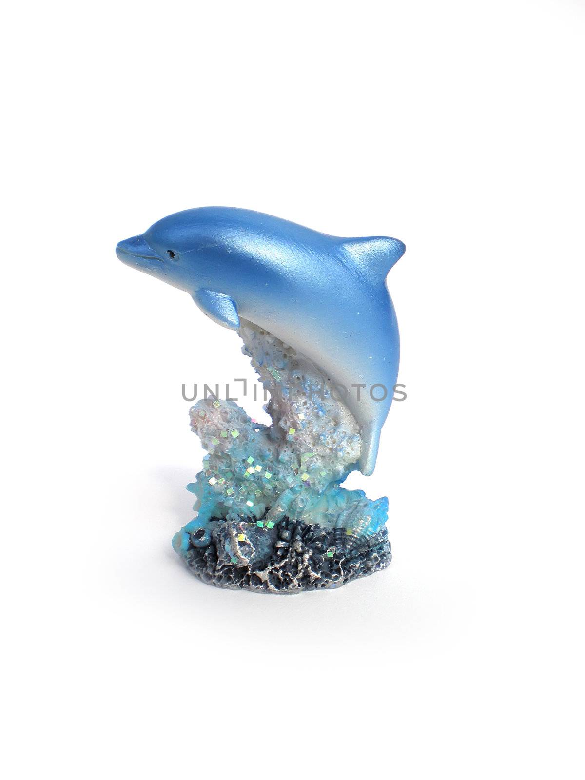 dolphine statue over corals isolated on white background