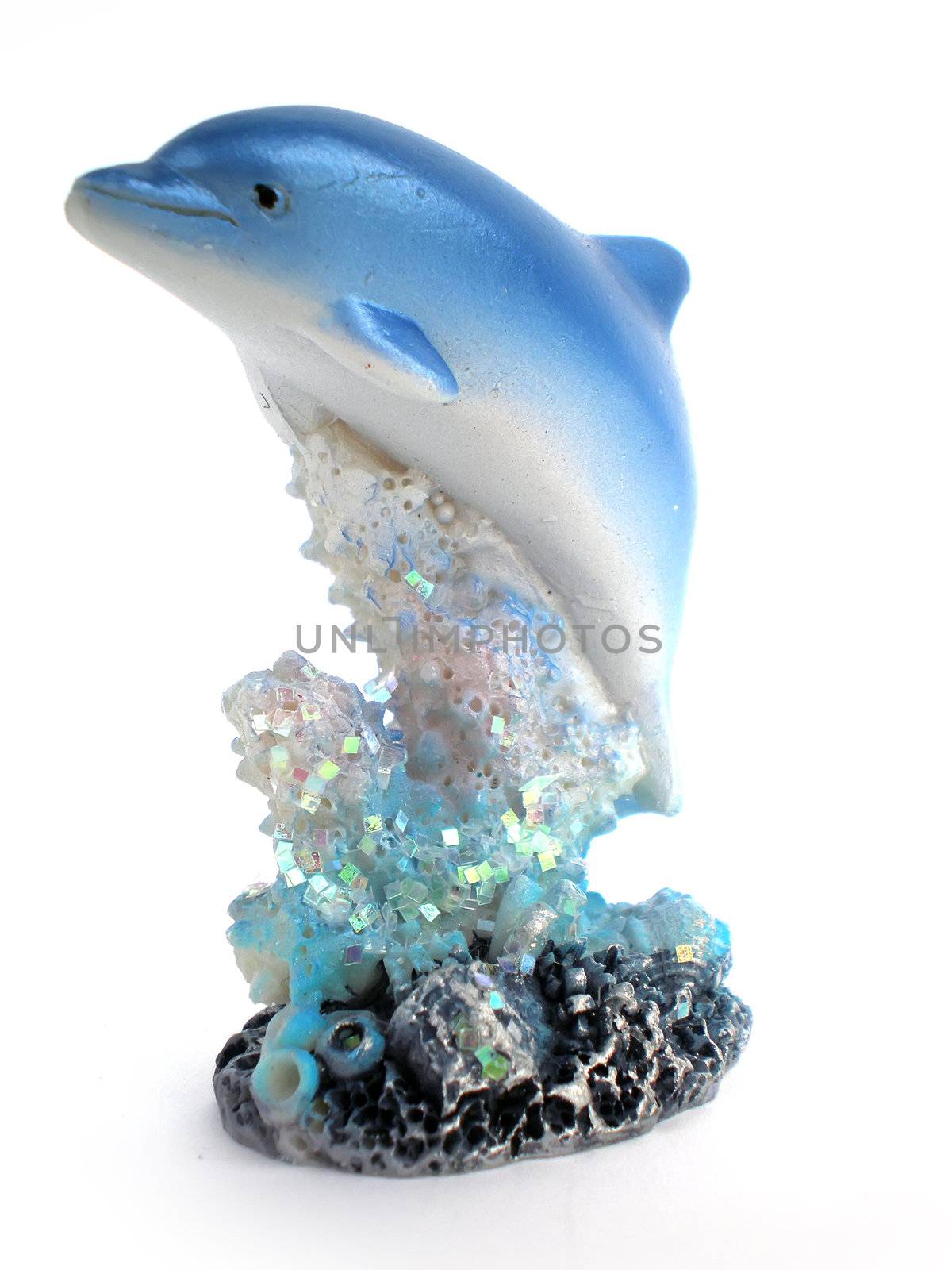 dolphine statue over corals isolated on white background