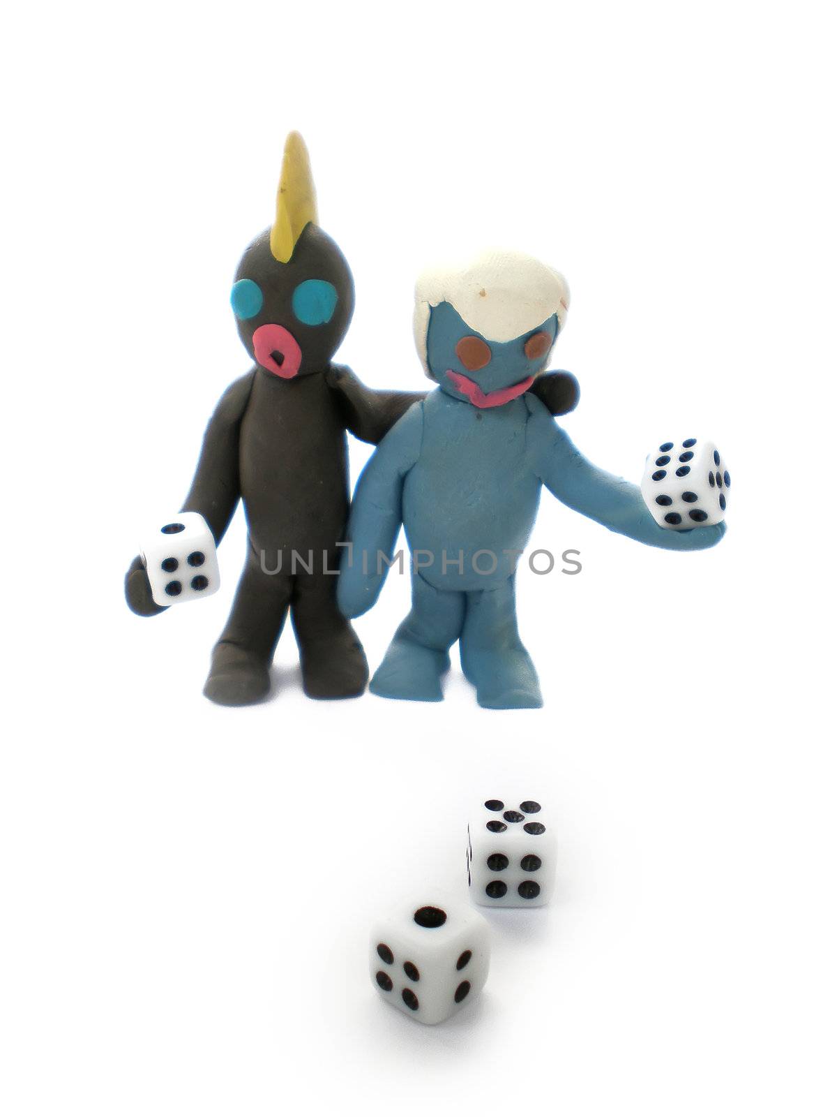 plasticine people figures playing with dice by Dessie_bg