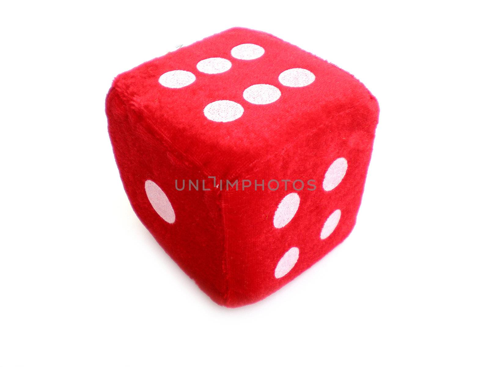 one red die isolated on white background  