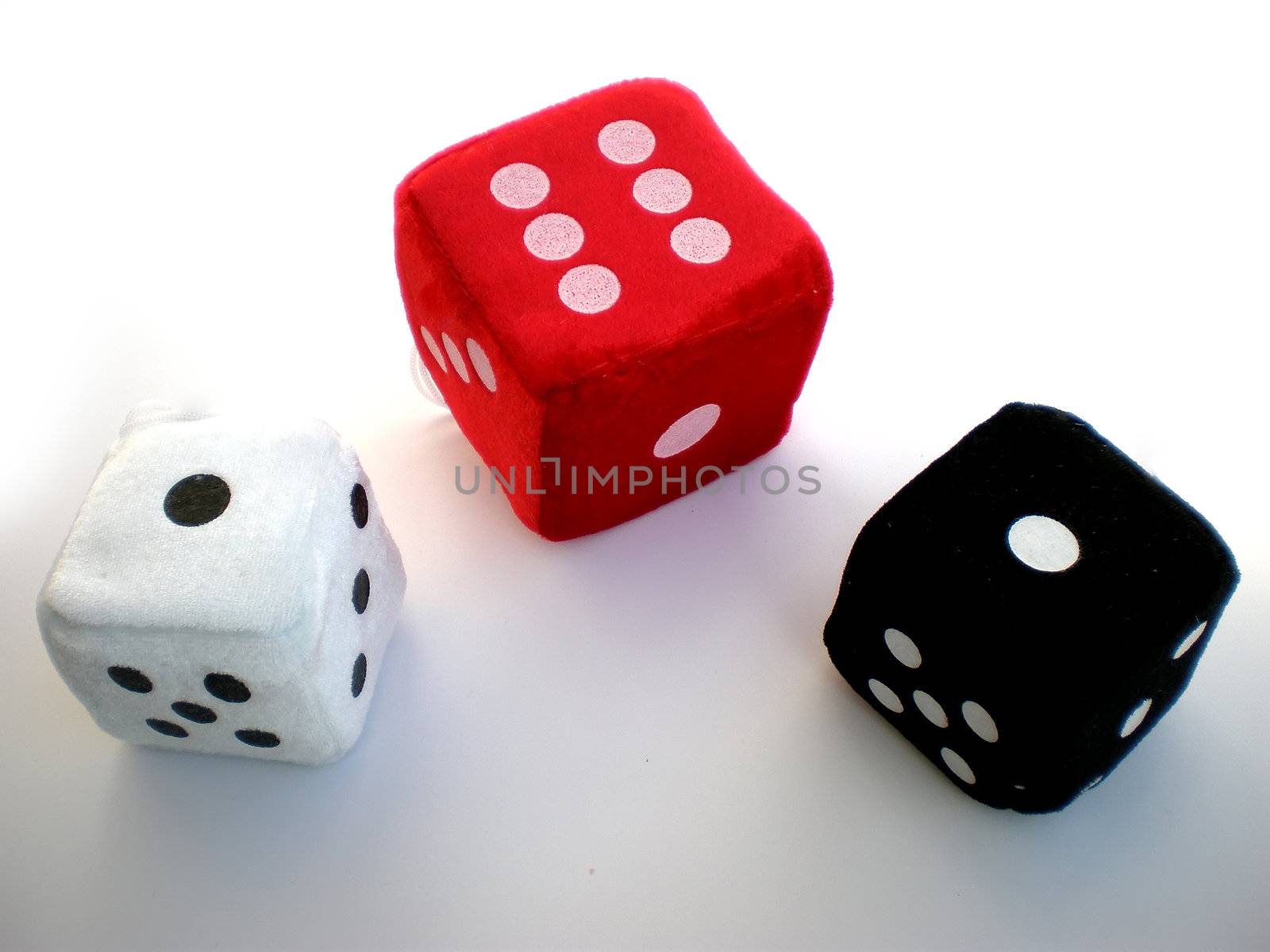 red, black and white dice isolated on white background