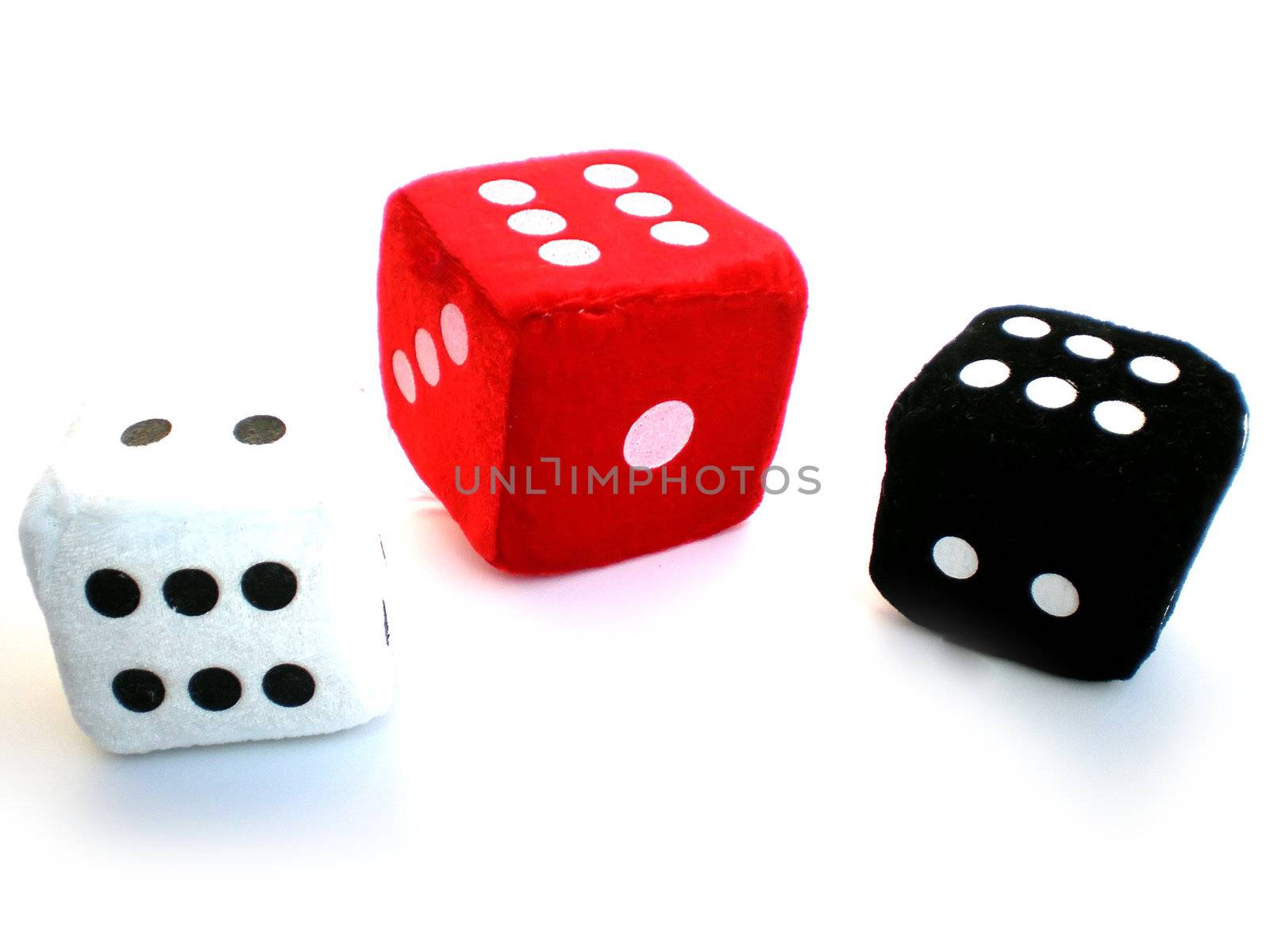 red, black and white dice isolated on white background