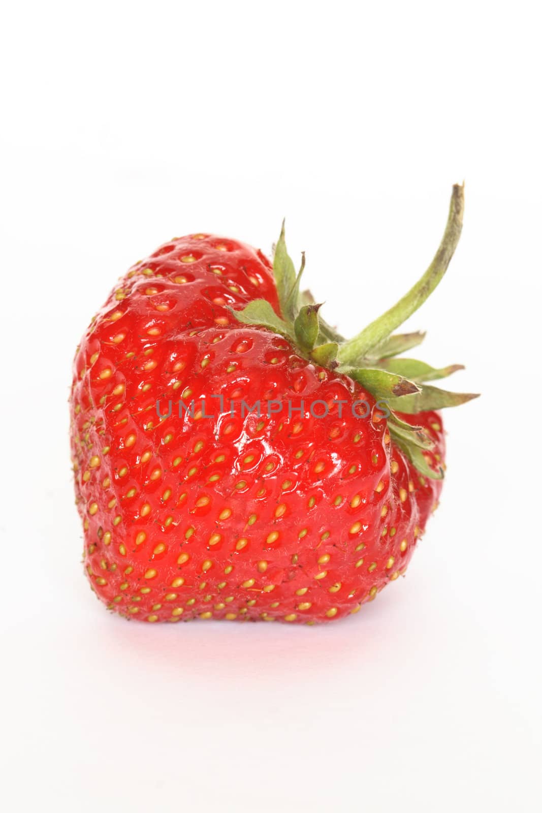 Closeup of fresh strawberry isolated on white background