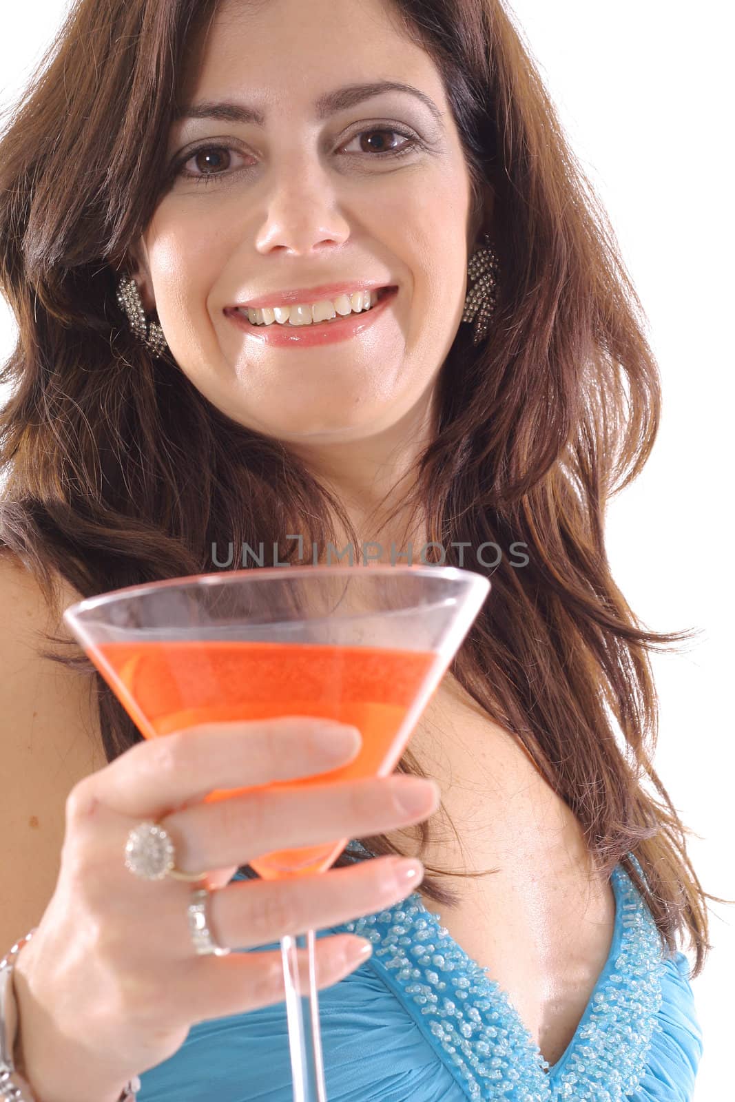 shot of a woman in evening dress with cocktail by creativestock