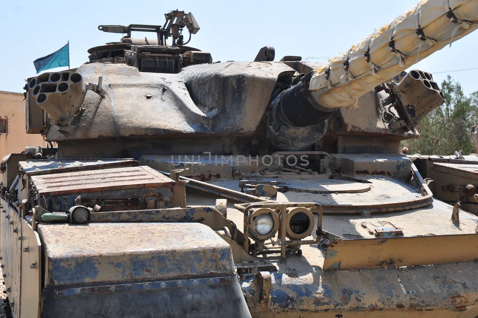 Old tank against the blue sky . Israel, Latrun.