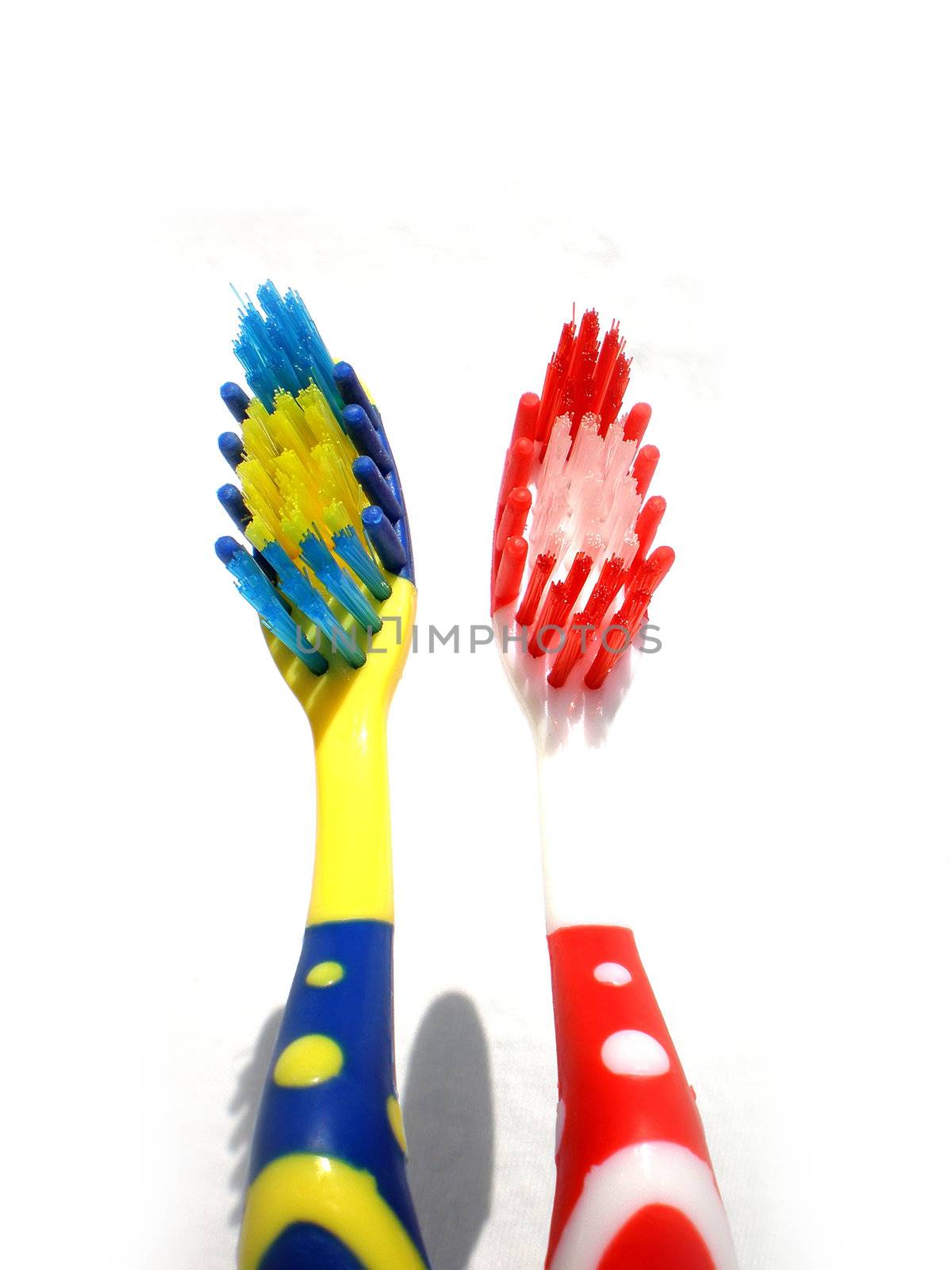 toothbrushes isolated on white background by Dessie_bg
