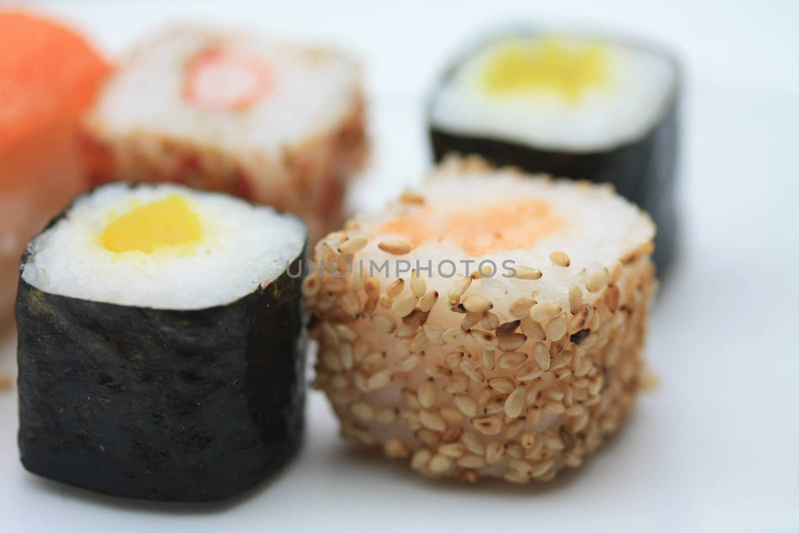 traditional Japanese sushi, rolled in seaweed, made from different sorts of raw fish