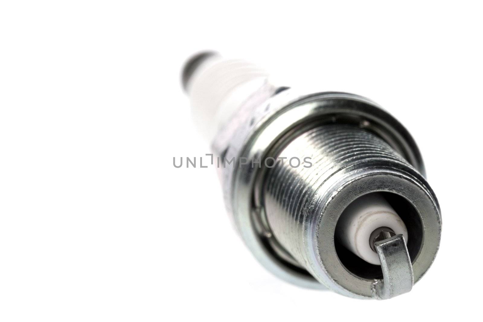 Isolated image of a spark plug.