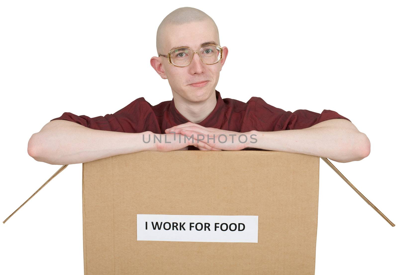 Man in carton box with inscription "I work for food"