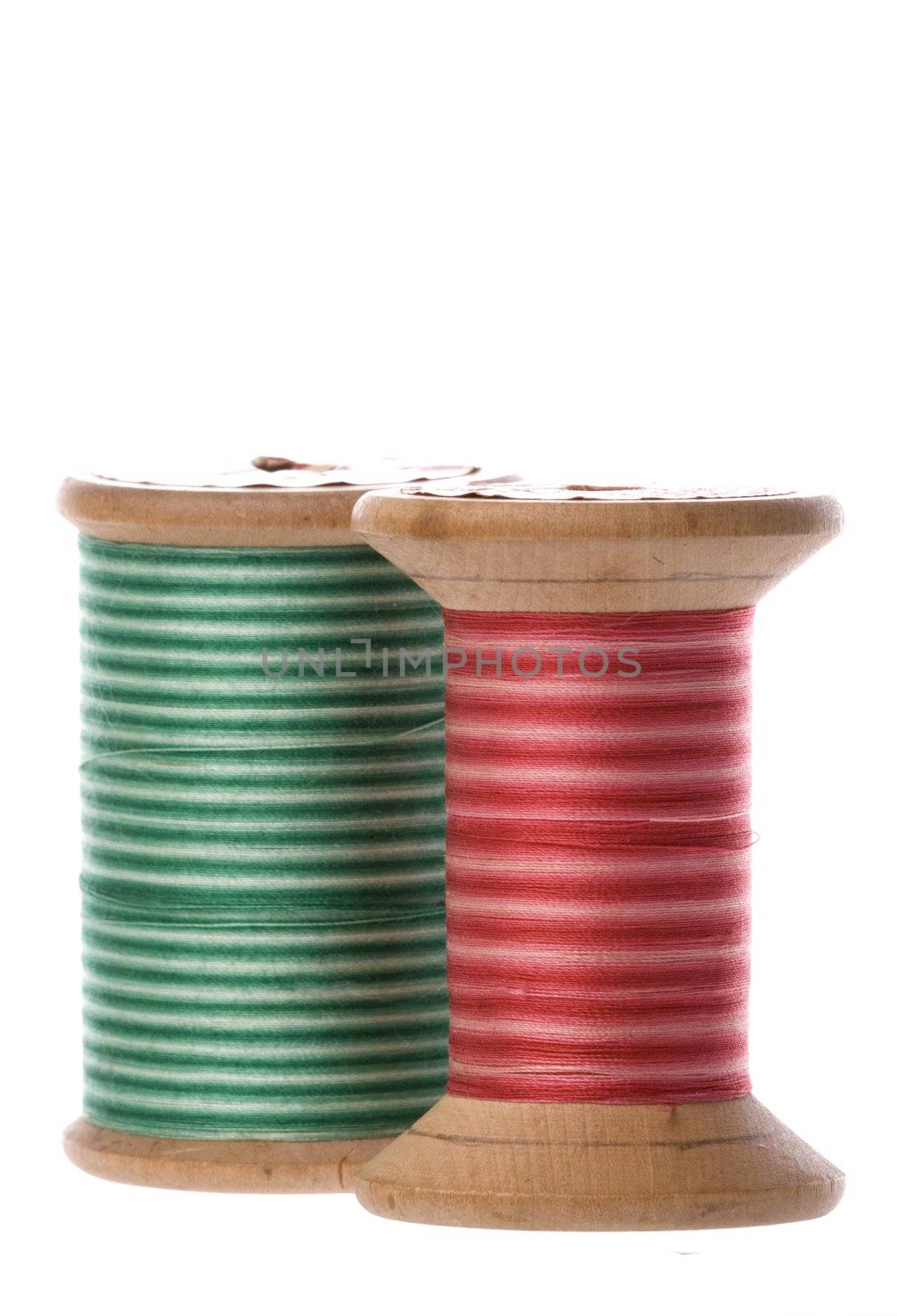 Isolated macro image of vintage embroidery threads.