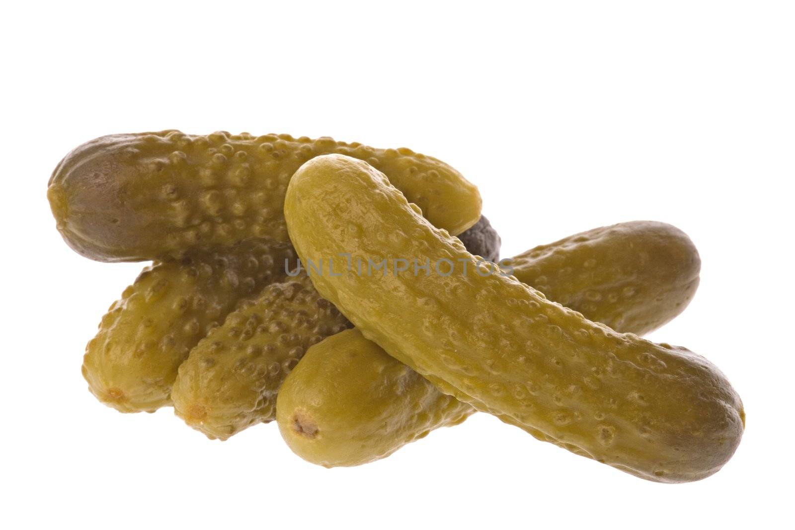Isolated macro image of pickled gherkins.