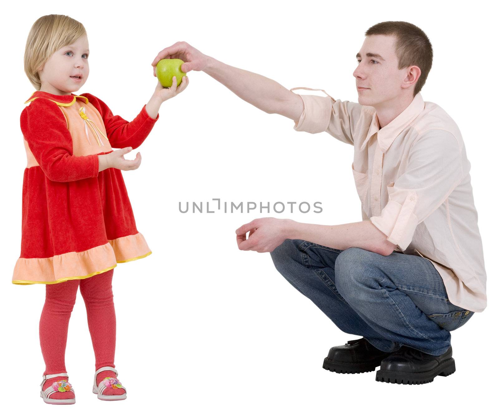 Man give green apple to the girl on white 