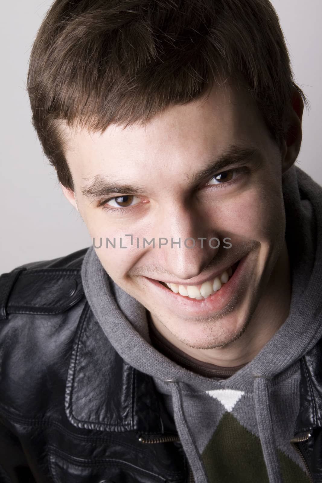 Portrait of a handsome young man smiling