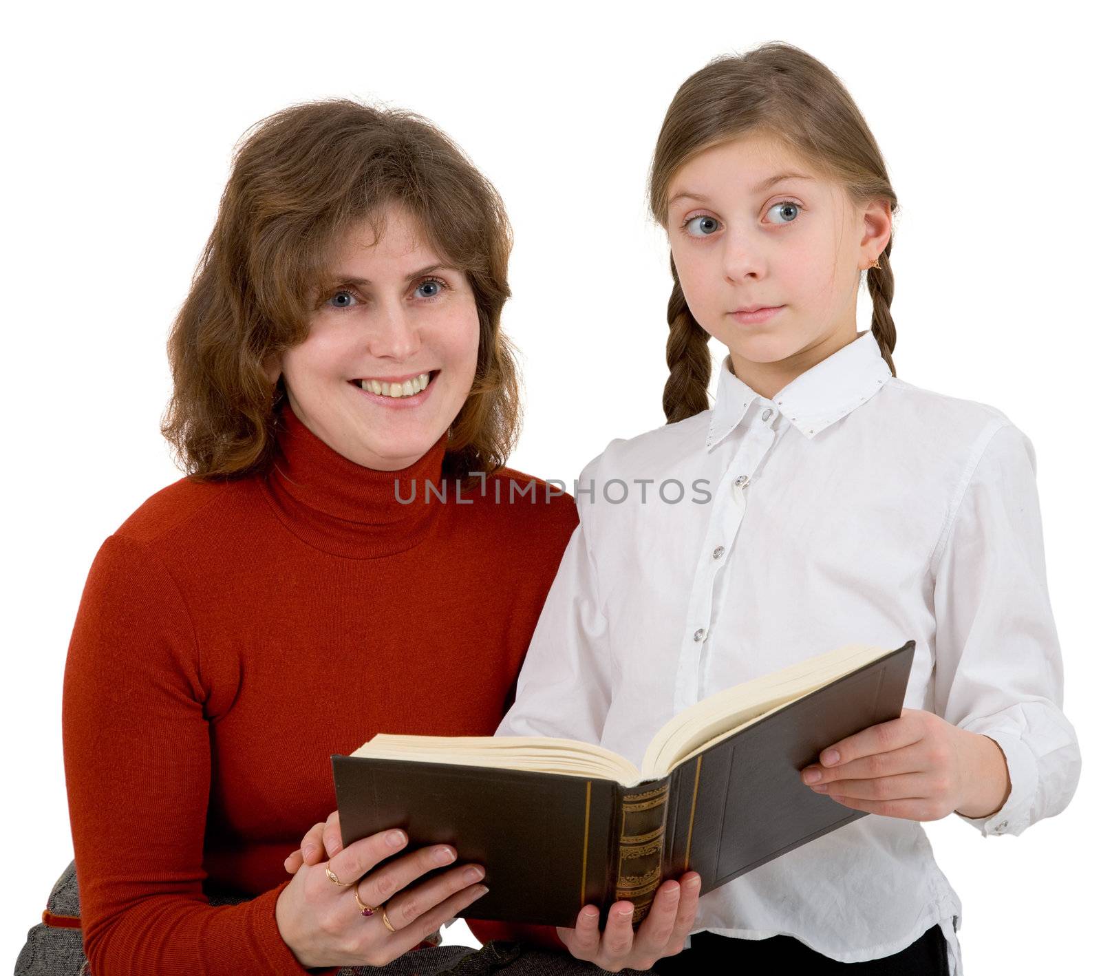 Woman with girl reading book on white 