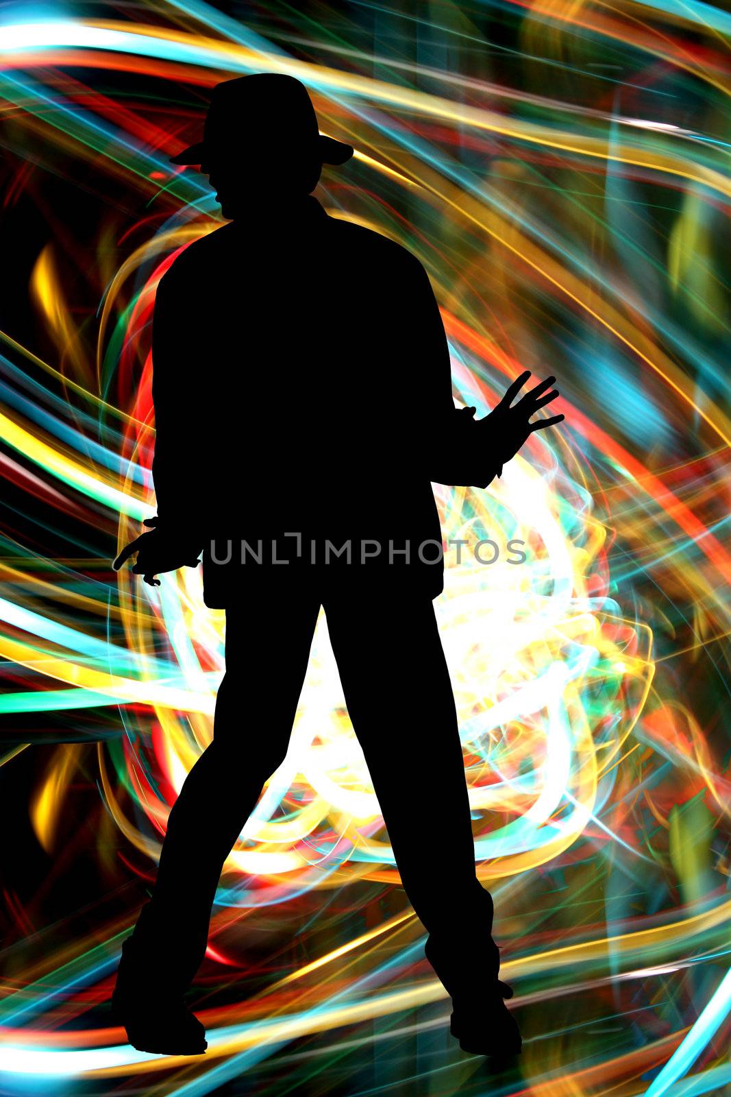 A silhouette of a Michael Jackson like dancer on colorful light streaks.