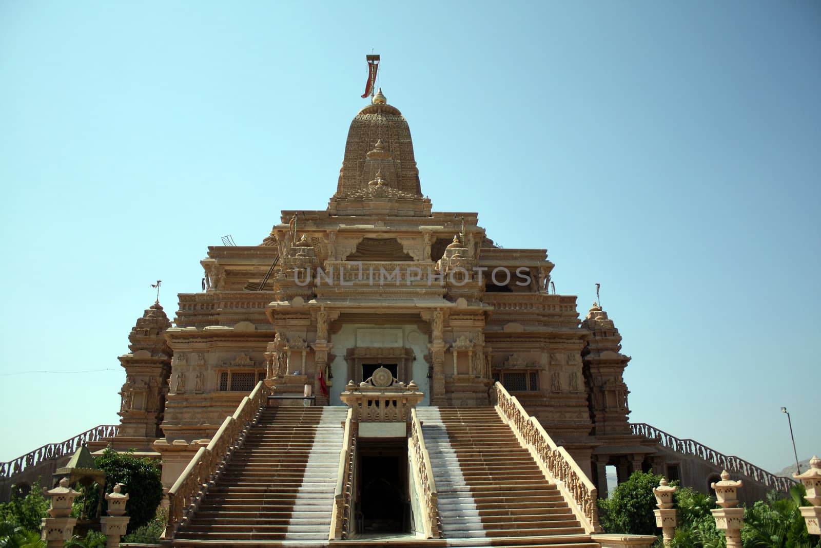 A beautiful marble temple of the Jain religion on a hilltop, in India.