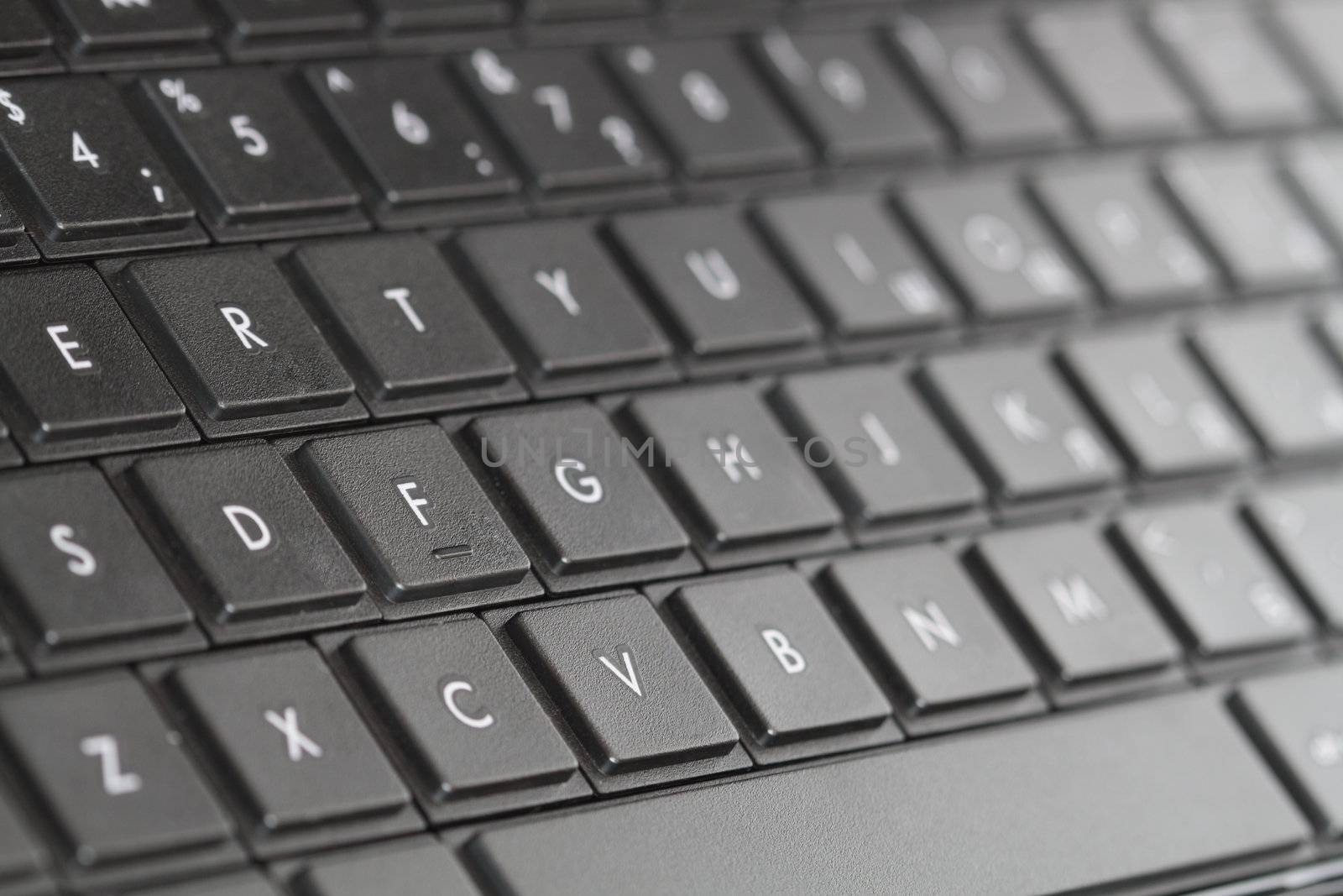 Closeup of black modern computer laptop keyboard