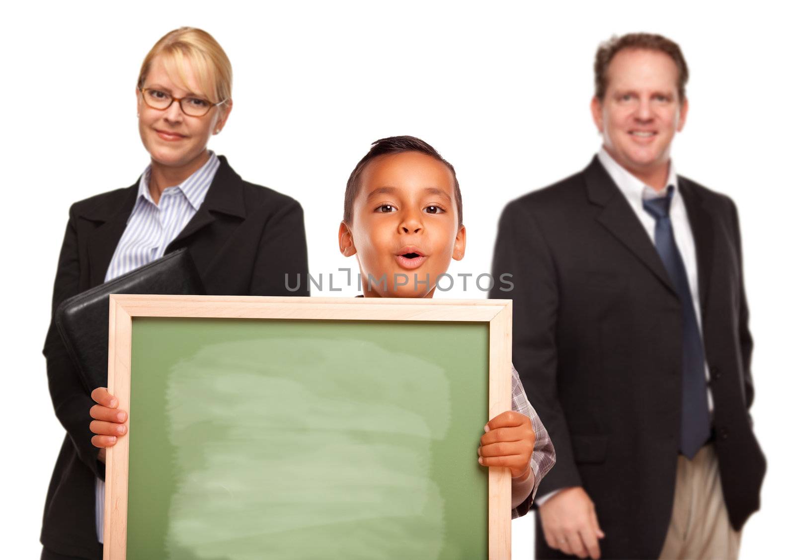 Hispanic Boy Holding Chalk Board with Female and Male Teachers Behind Isolated on a White Background.