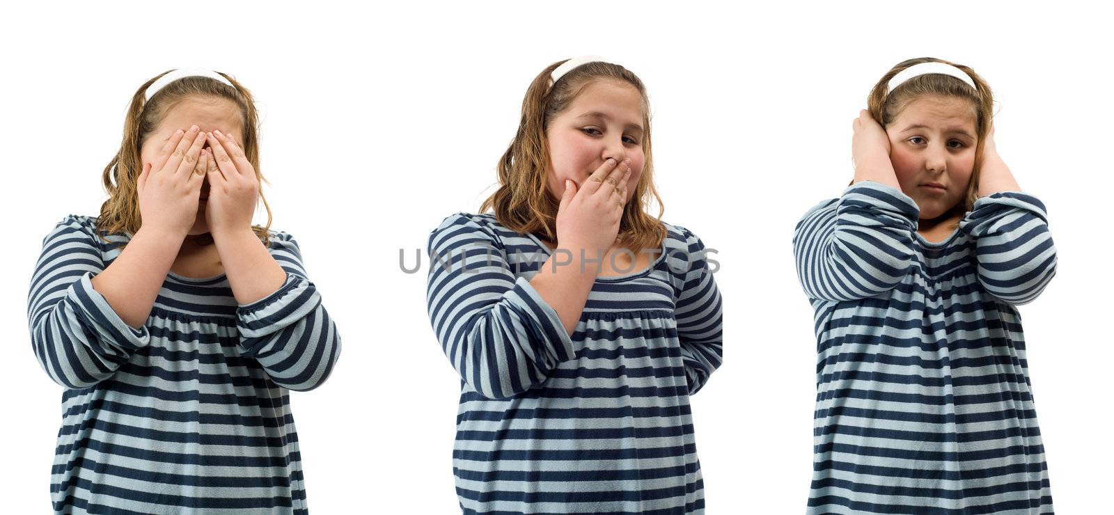 Young girl doing the actions for see, speak, and hear no evil, isolated against a white background