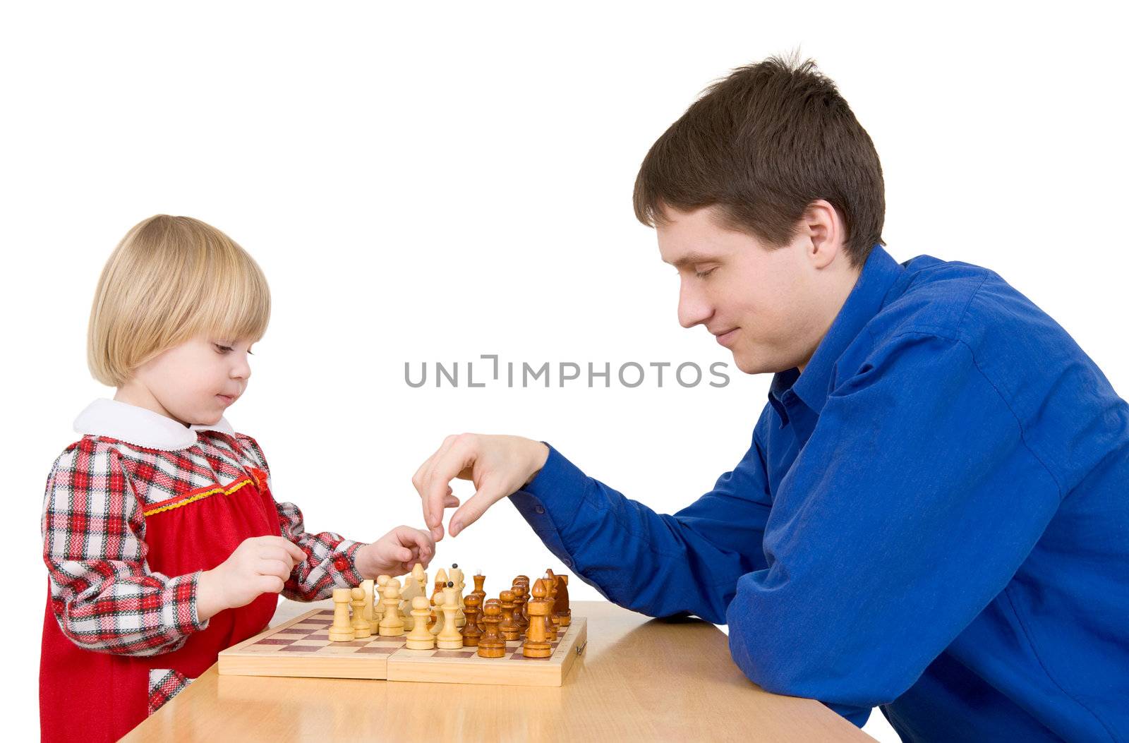 Man and girl play chess on white 